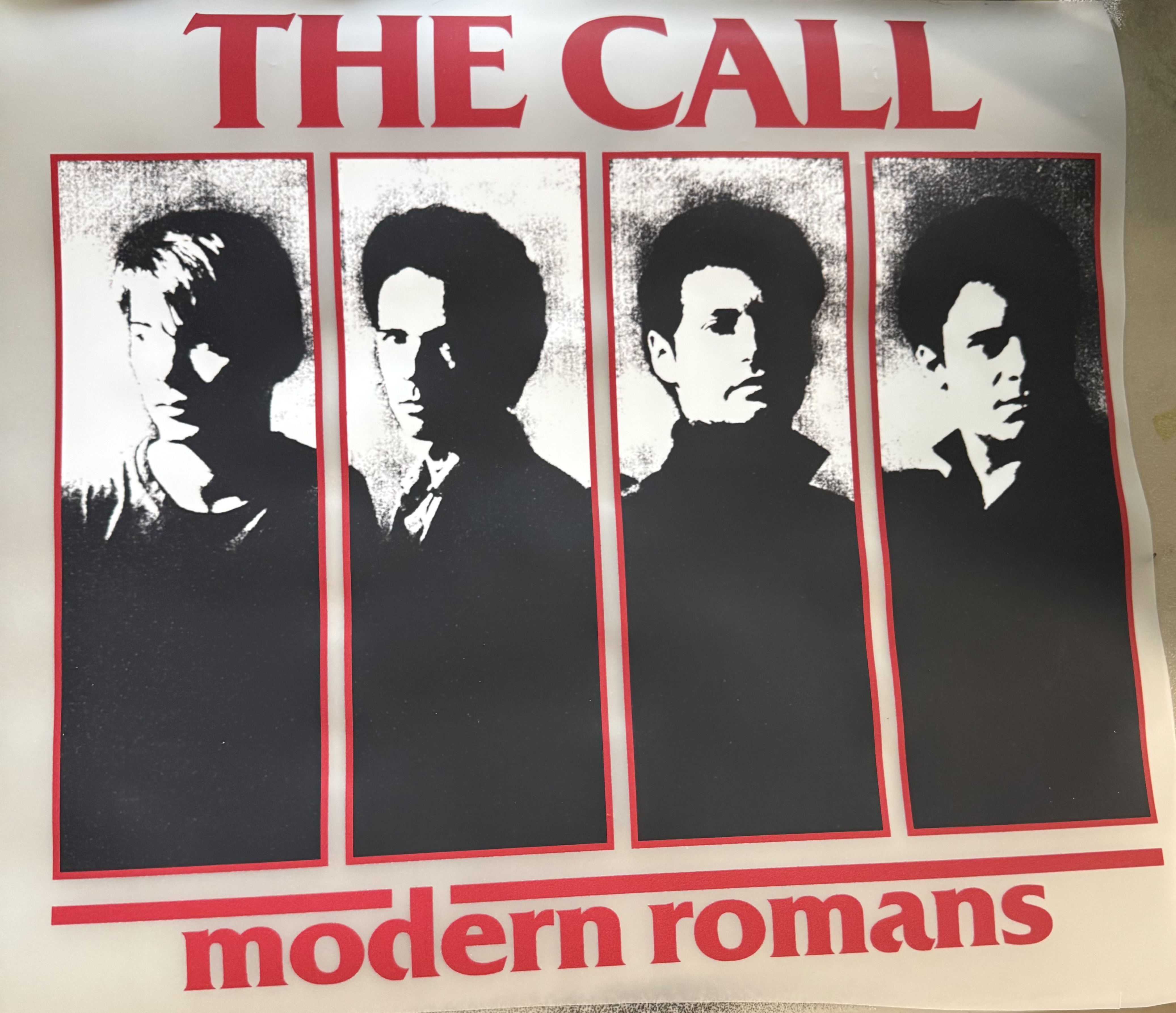 Customer-designed THE CALL print with red lettering and four black-and-white portraits.
